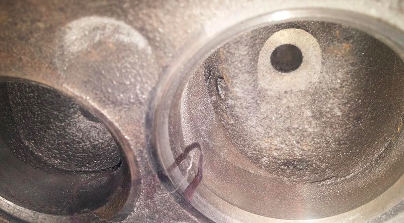 Bobby’s Jeep’s head had a crack right between the valves (the crack is circled with a marker).